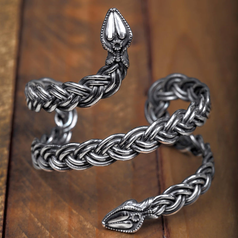 'Close-up of Ferunas cuff bracelet in sterling silver, serpent design, the Wise One collection.’