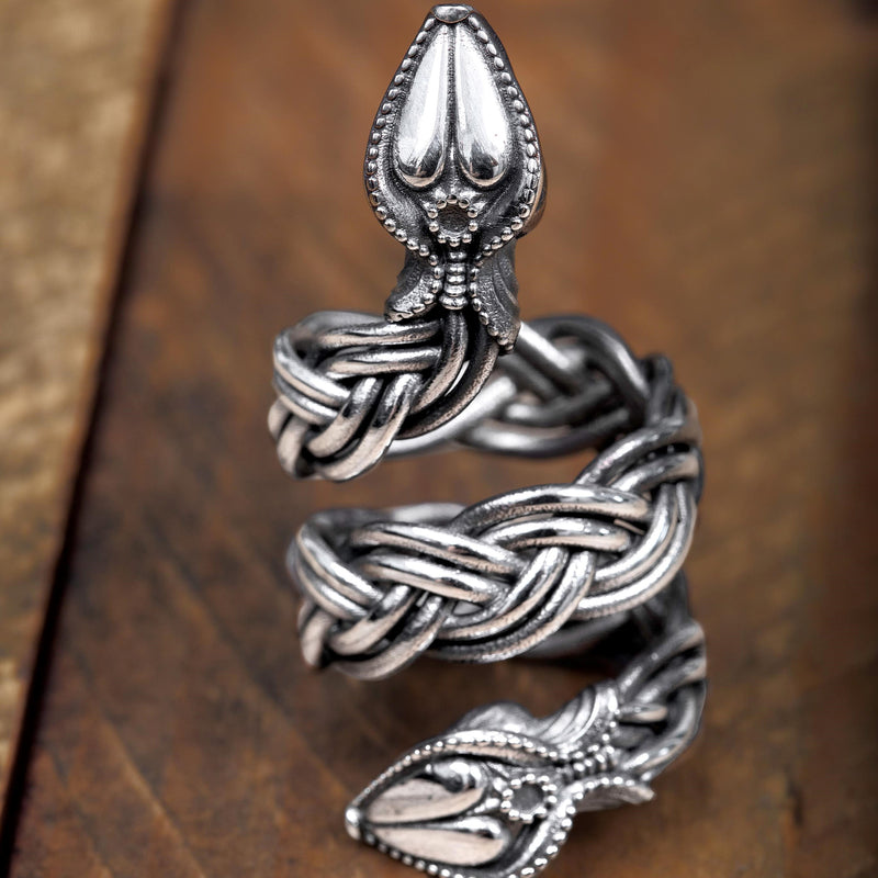 ‘ Side view of serpent ring in recycled silver, the Wise One collection.’
