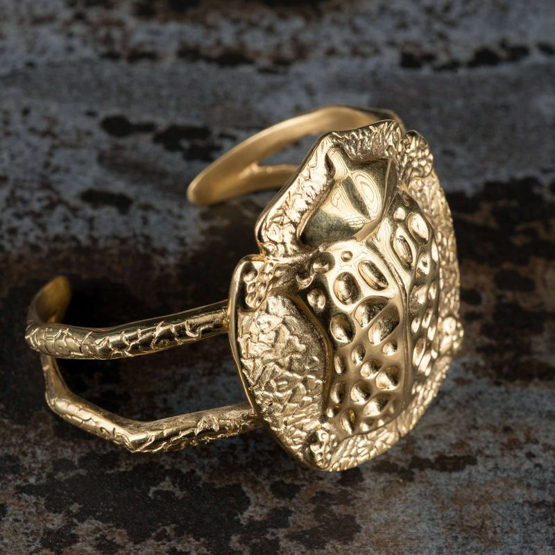  ‘Cuff bracelet in recycled gold, the messenger collection, beetle design.’