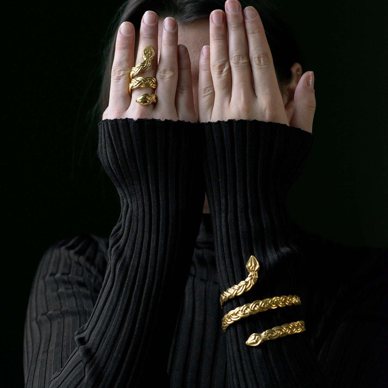 ‘Close-up of Ferunas cuff bracelet in recycled gold, serpent design, the Wise One collection.’