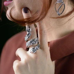 ‘Close-up of serpent ring in recycled silver, the Wise One collection.’